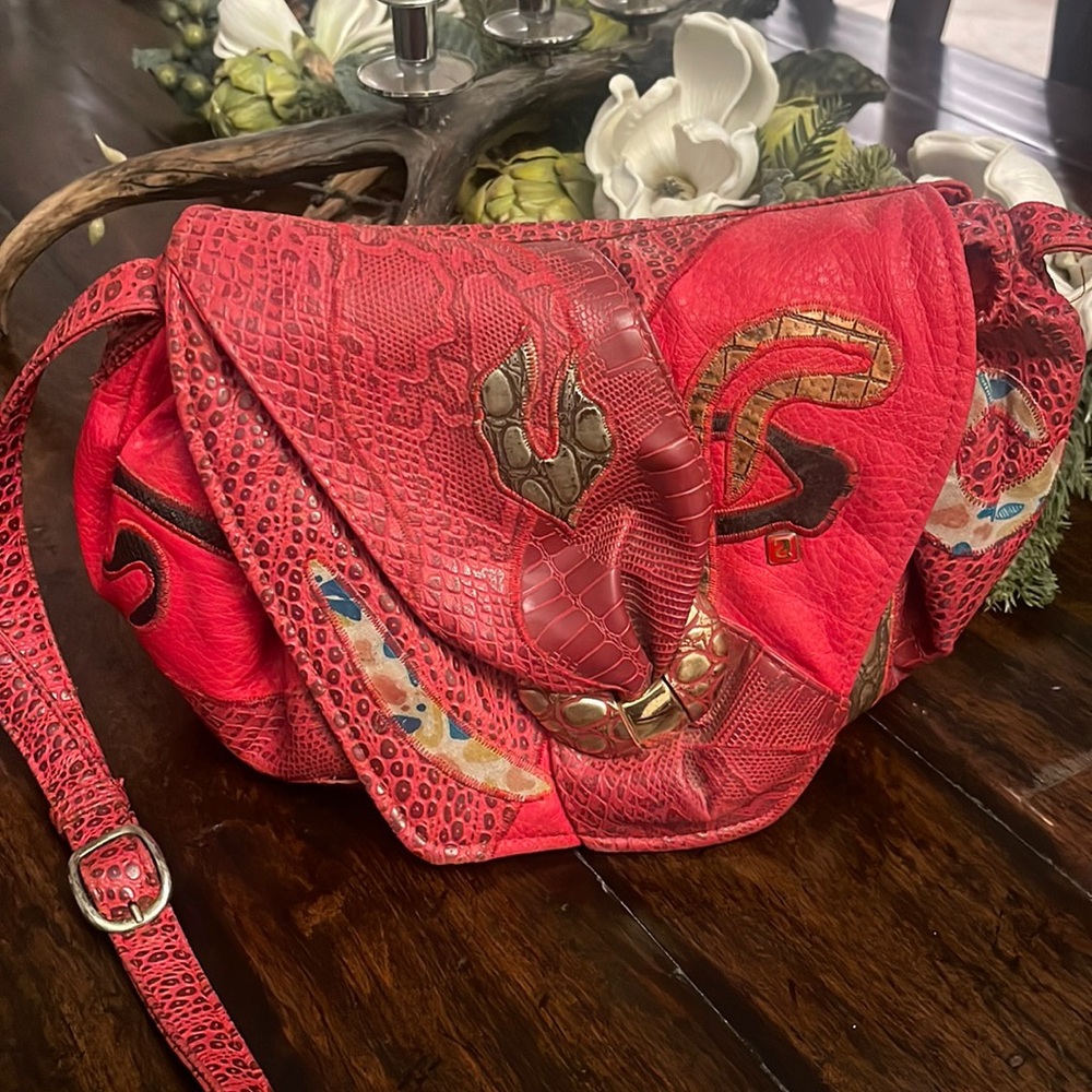 Red Leather Crossbody Bag with Artistic Accents